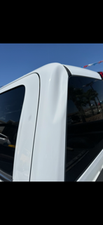 Dodge Ram C-pillar with dent before paintless dent repair